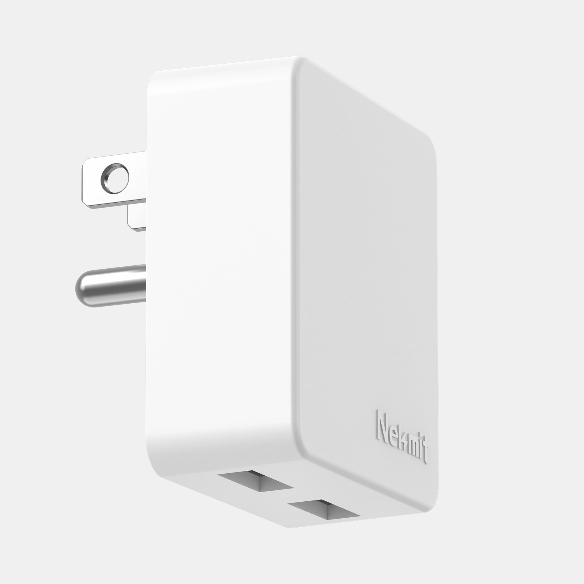White USB wall adapter with two ports on a light gray background