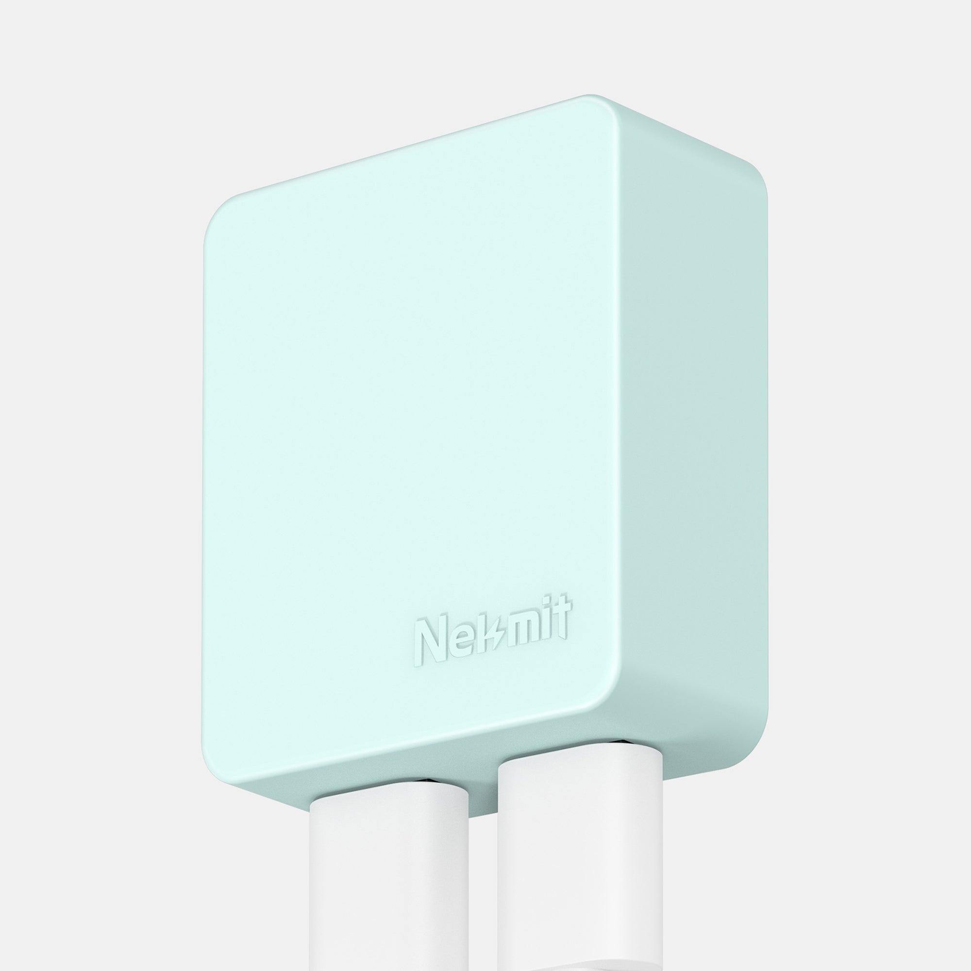 Mint green electronic device with 'Nelmini' branding on a light gray background