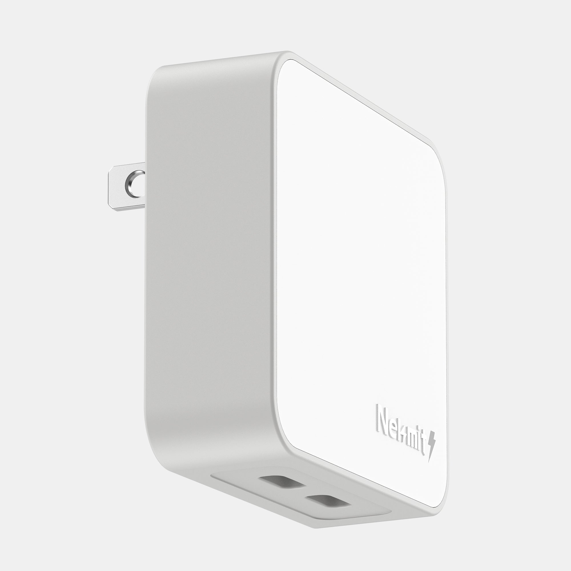 White power adapter with Netatmo logo on a light gray background