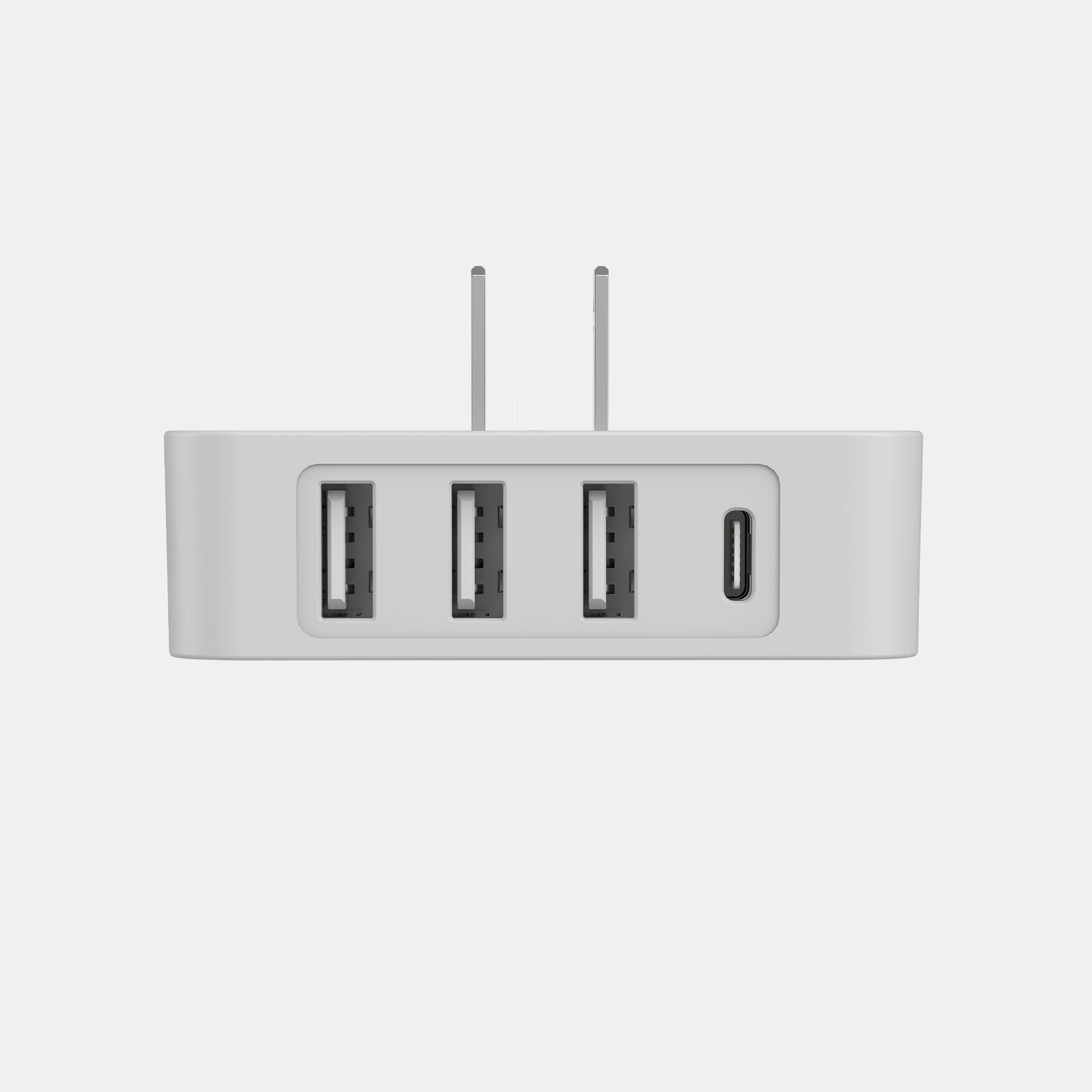 White USB hub with four ports on a light gray background