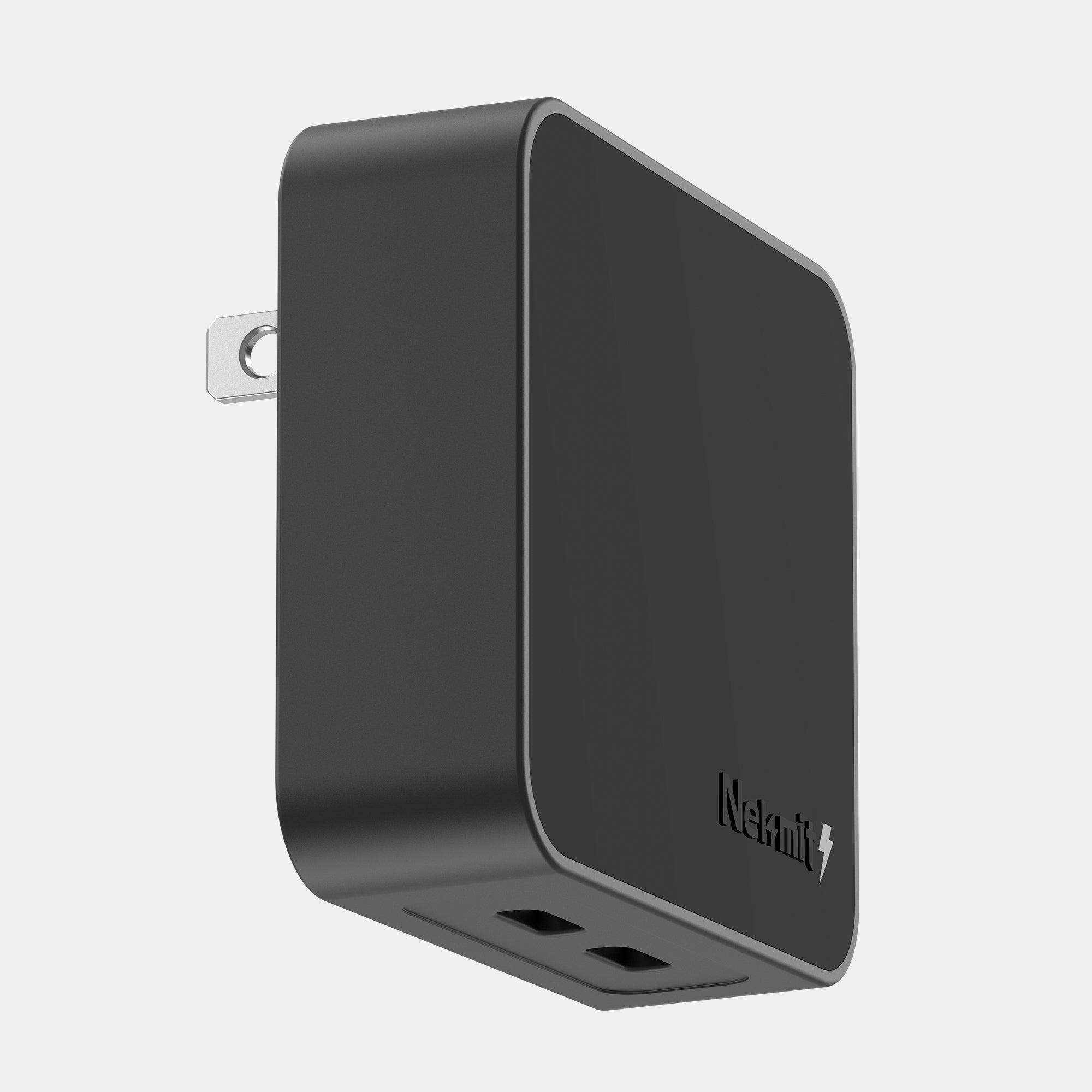 Black wall adapter with multiple ports on a white background