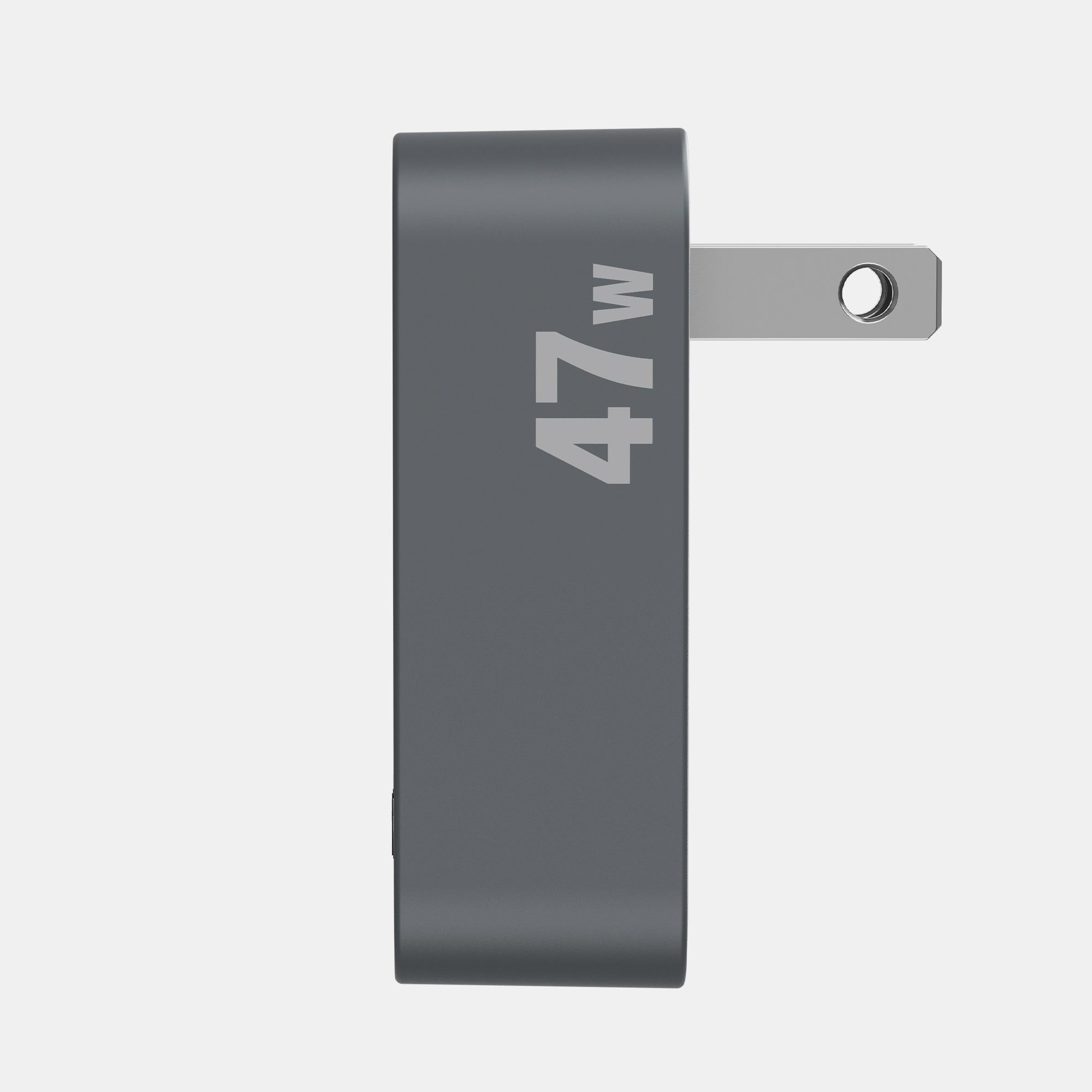 Gray power adapter with '47W' marking on a white background