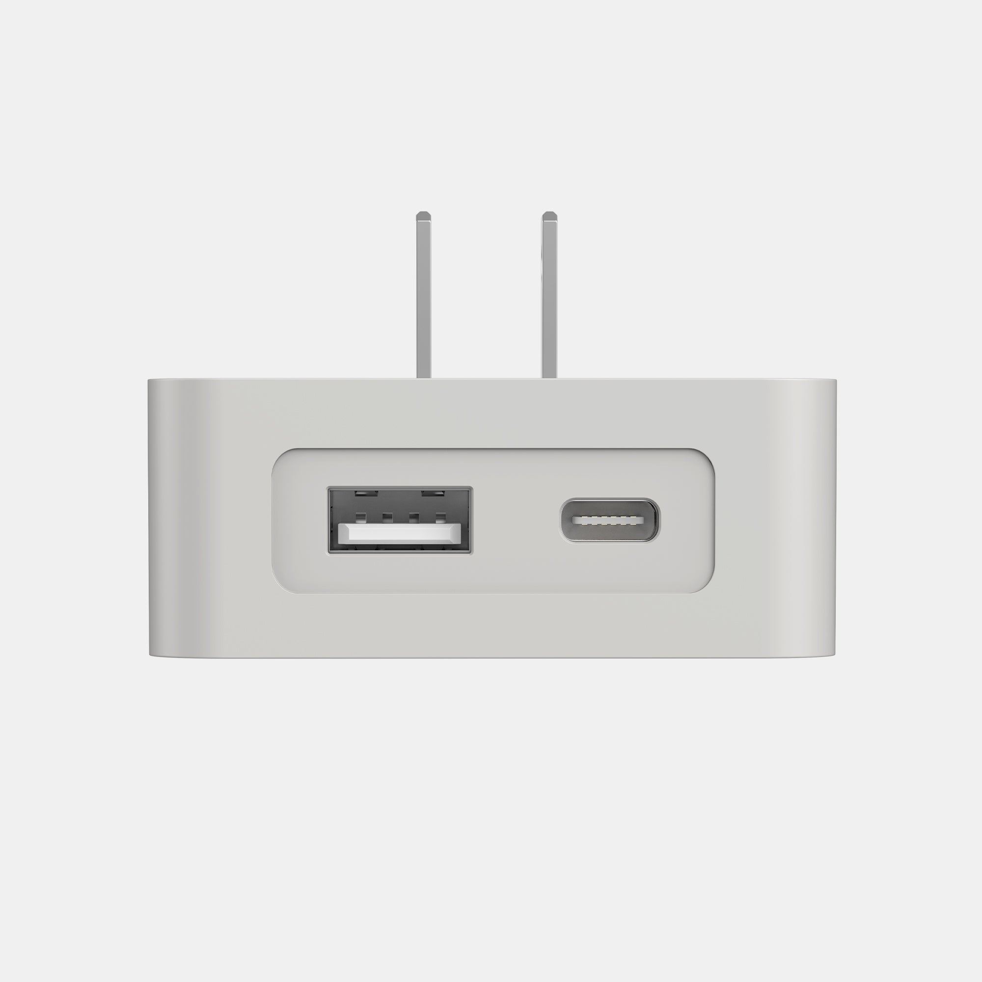 Rectangular electronic device with USB and HDMI ports on a light gray background
