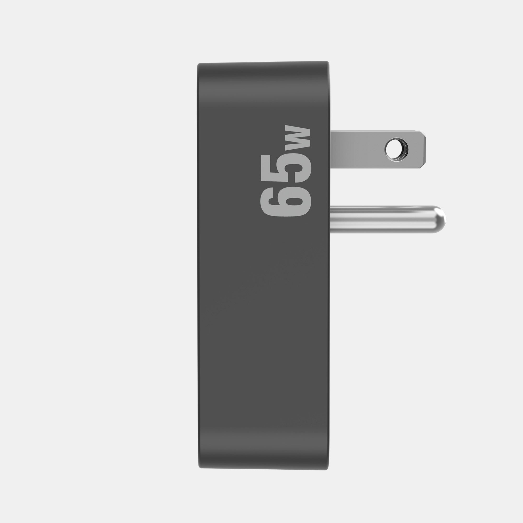 65W power adapter on a light gray background