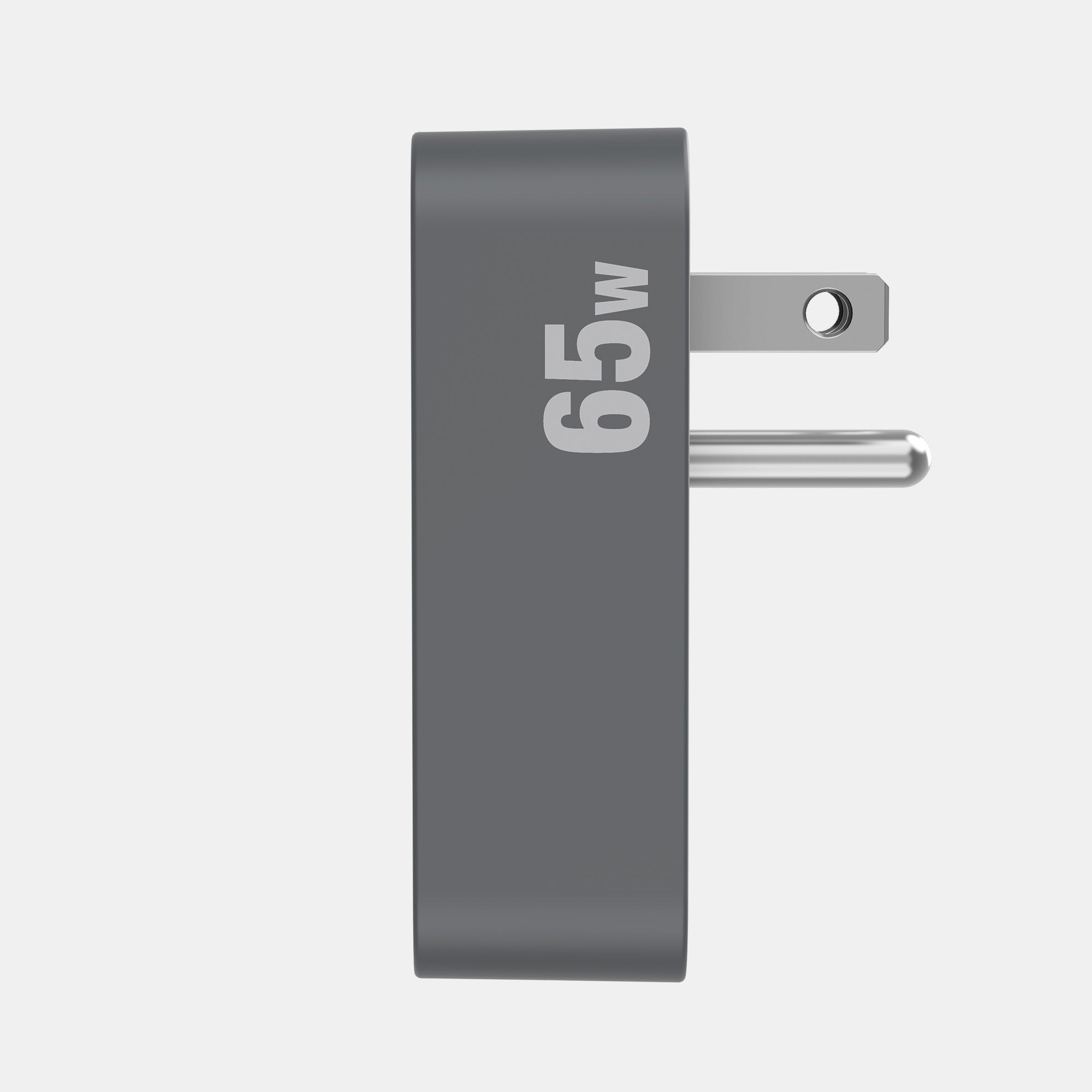 Gray power adapter with '65w' marking on a white background