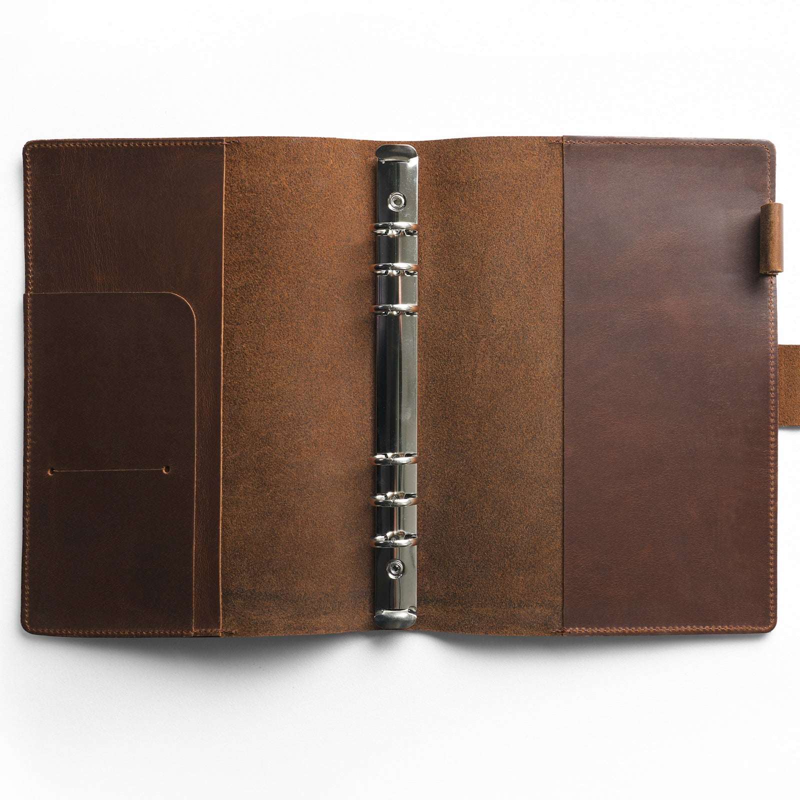 Brown leather binder with metal ring on a white background