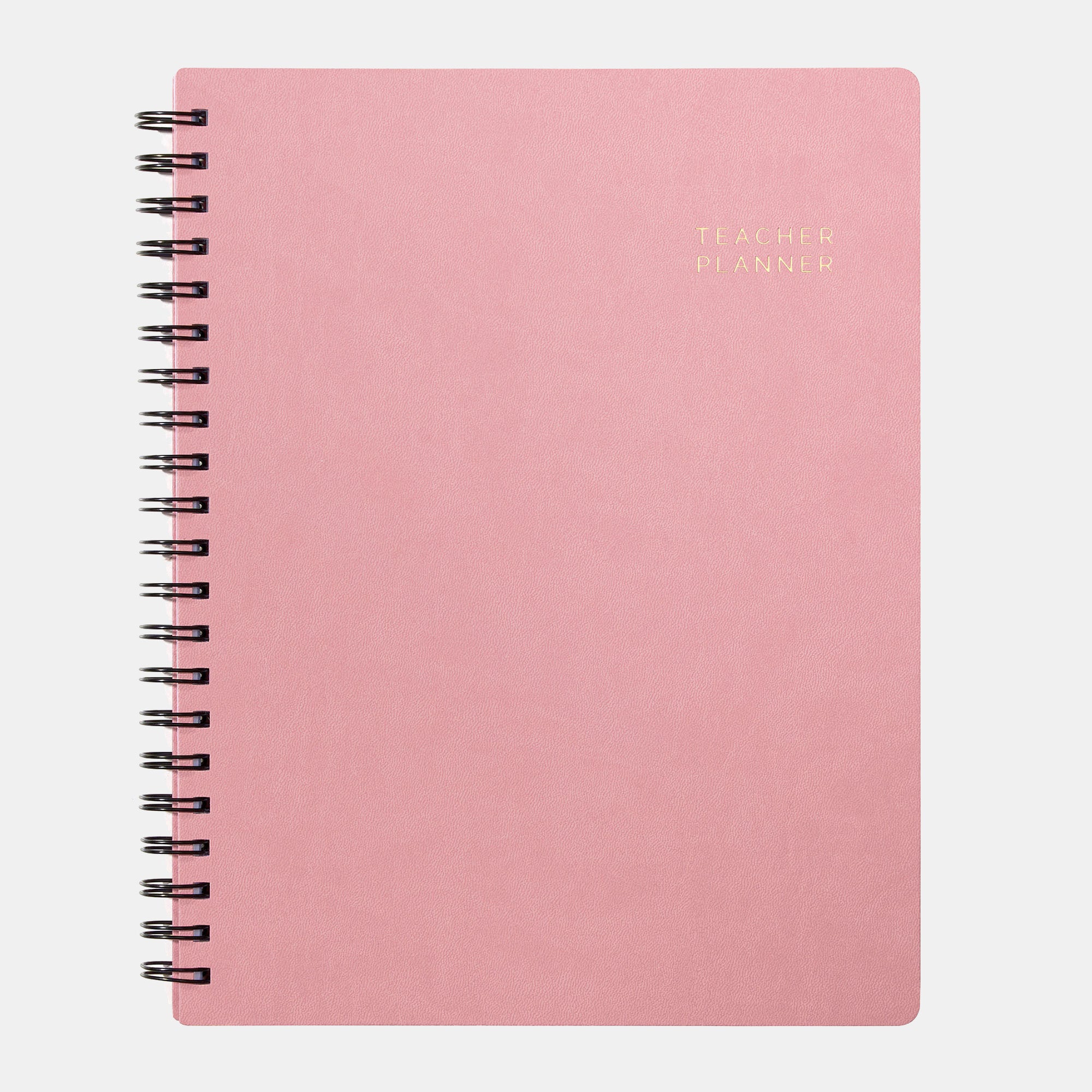 Pink planner with 'Teacher Planner' text on a white background