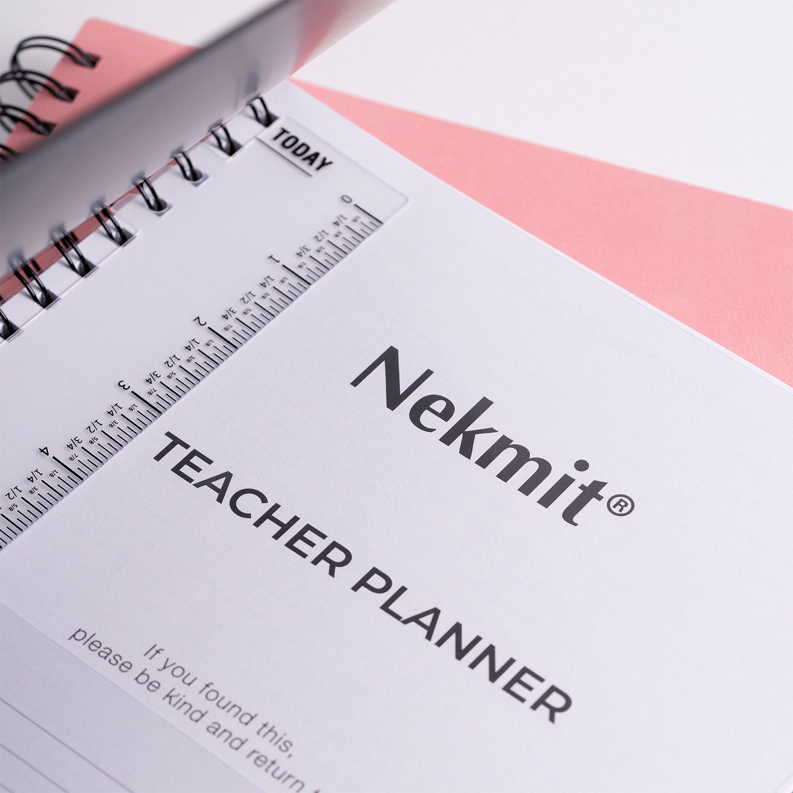 Nekmit Teacher Planner with ruler and text on a white background