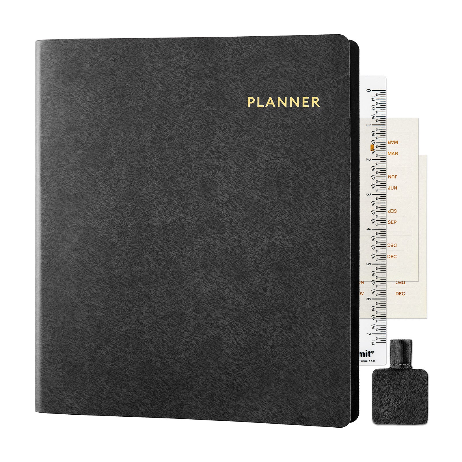 Black planner with gold text, small ruler, and black pen on a white background