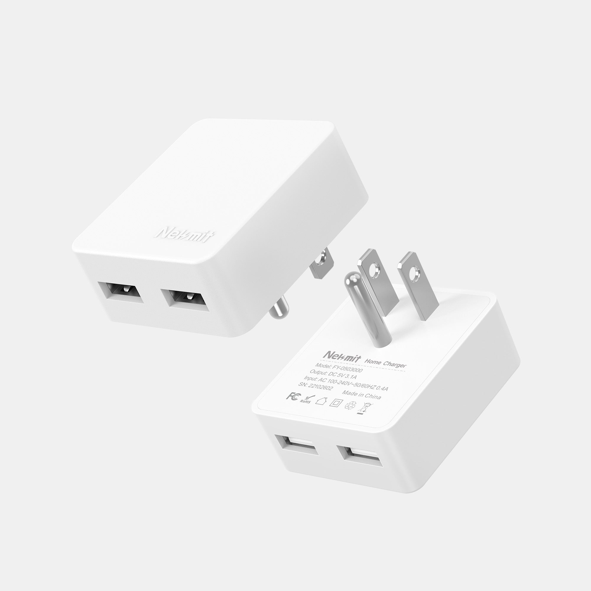 Two white USB wall adapters on a light gray background