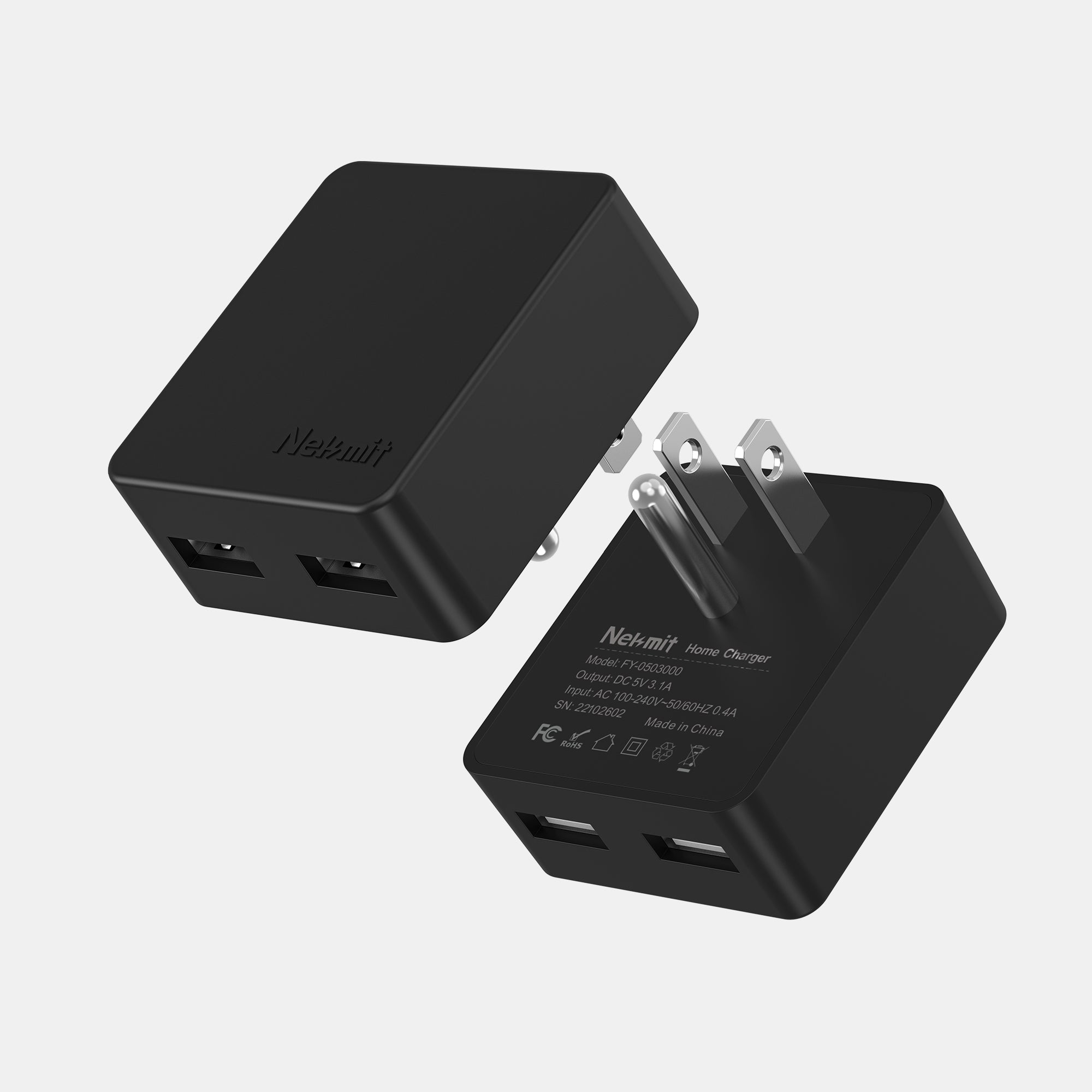 Two black wall adapters with multiple ports on a light gray background