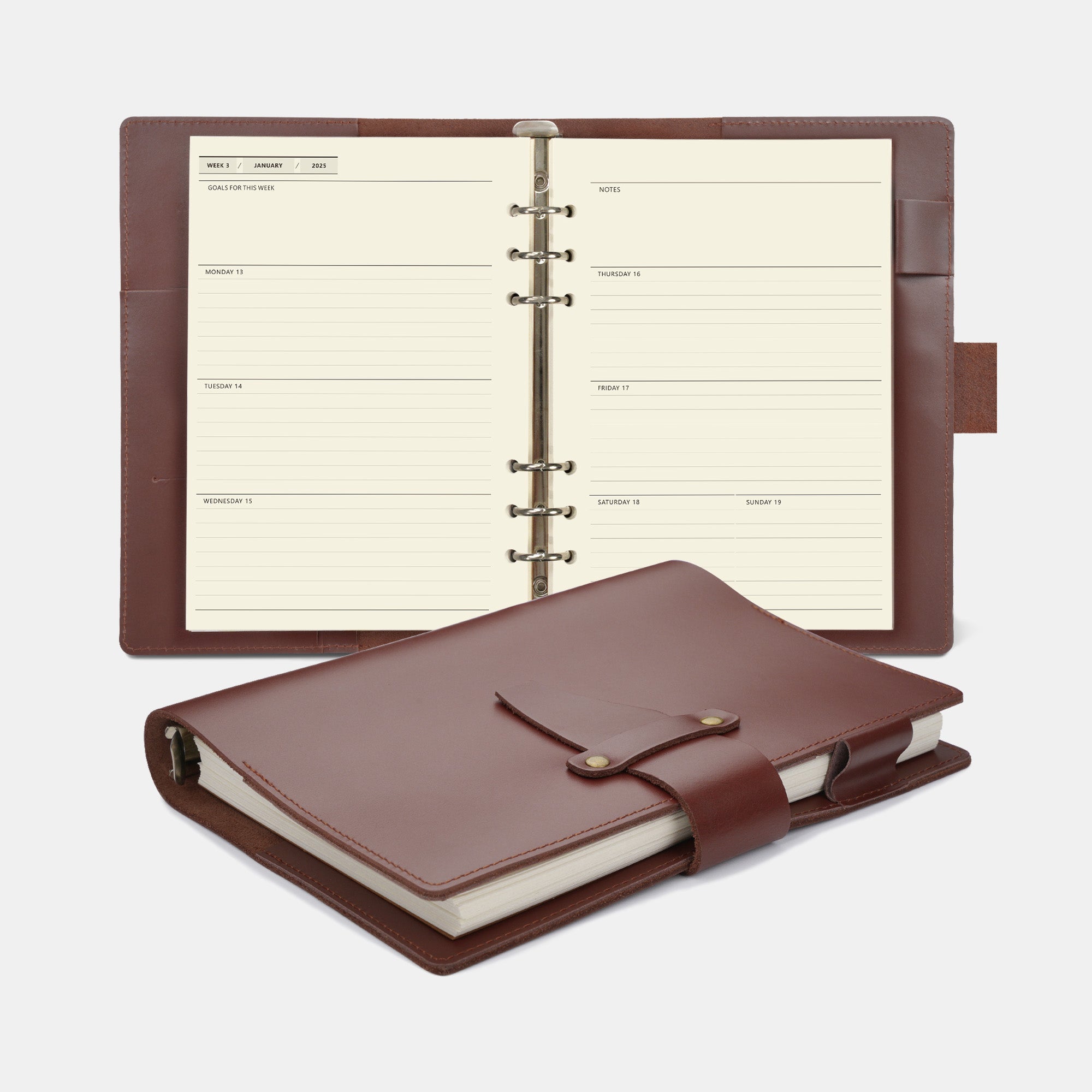 Brown leather planner with open pages on a white background