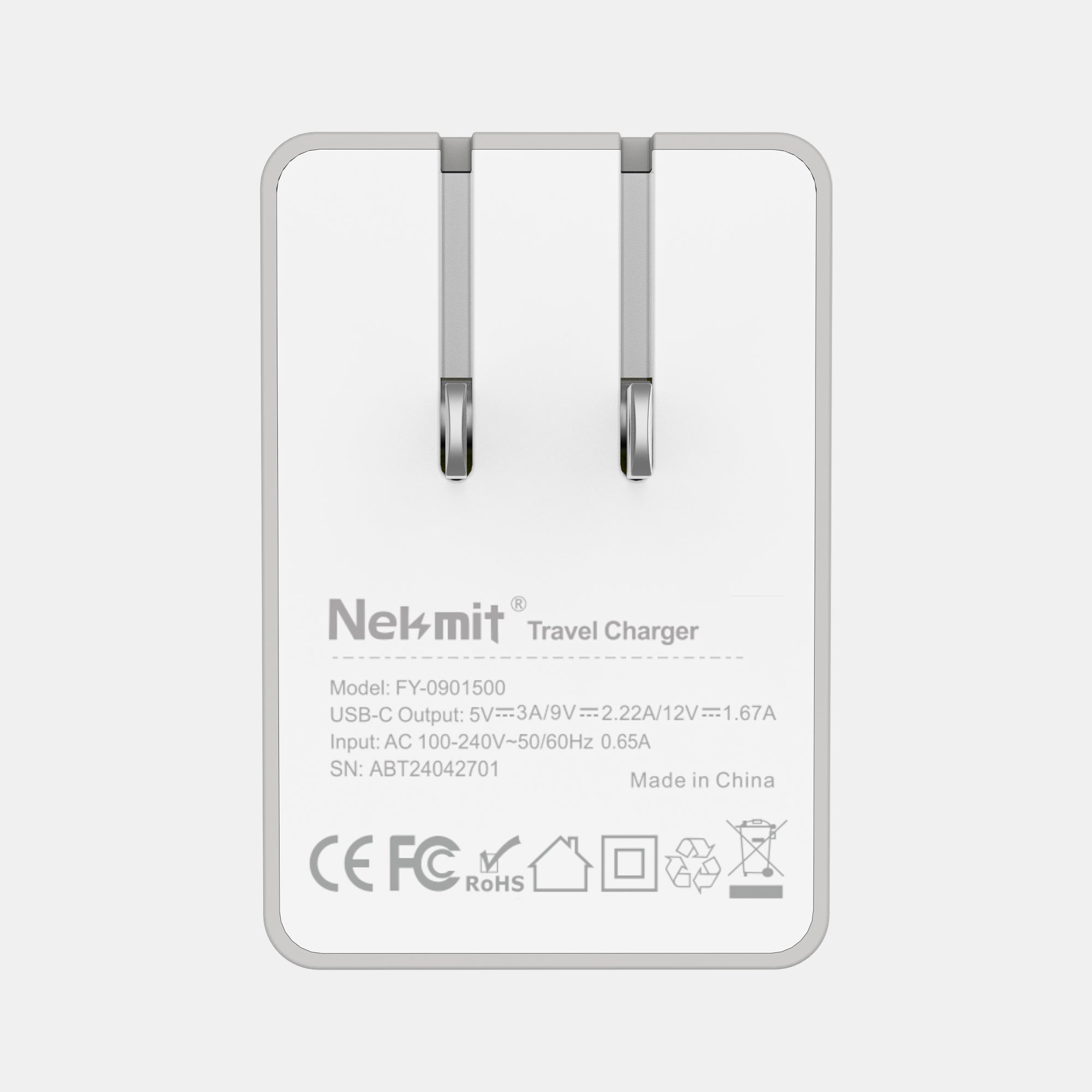 Nekmit travel charger on a light gray background
