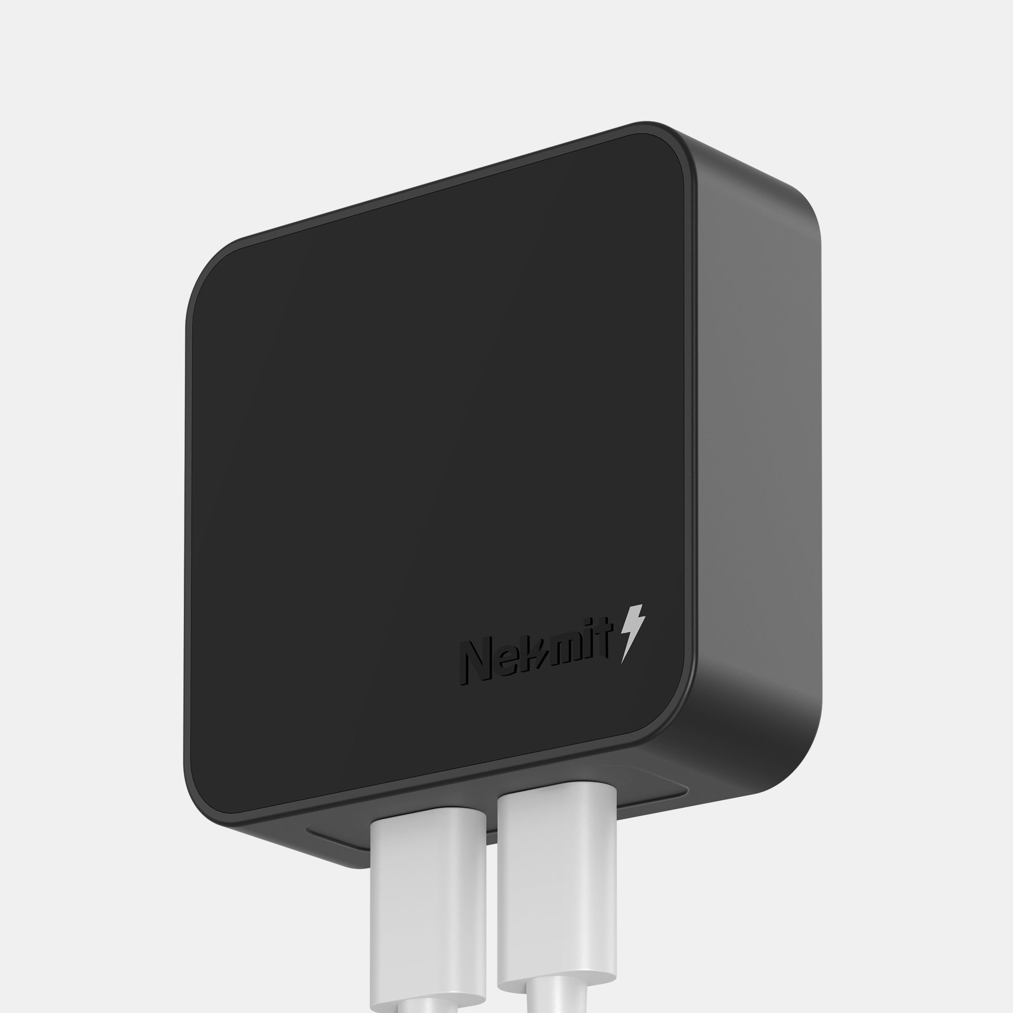 Black electronic device with 'Nexmitt' branding on a light gray background