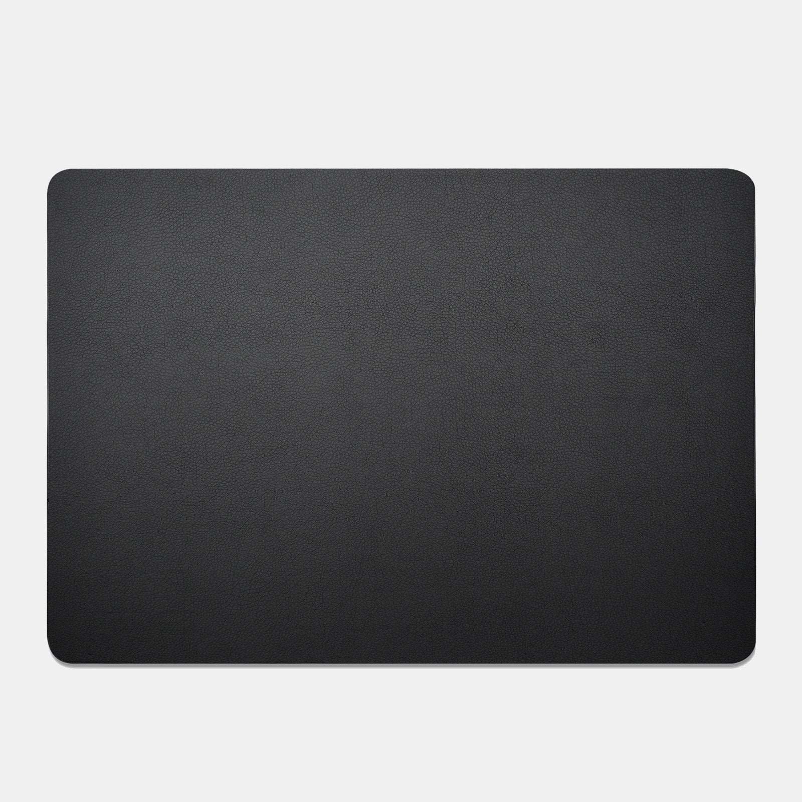 Black rectangular mat on a light gray background