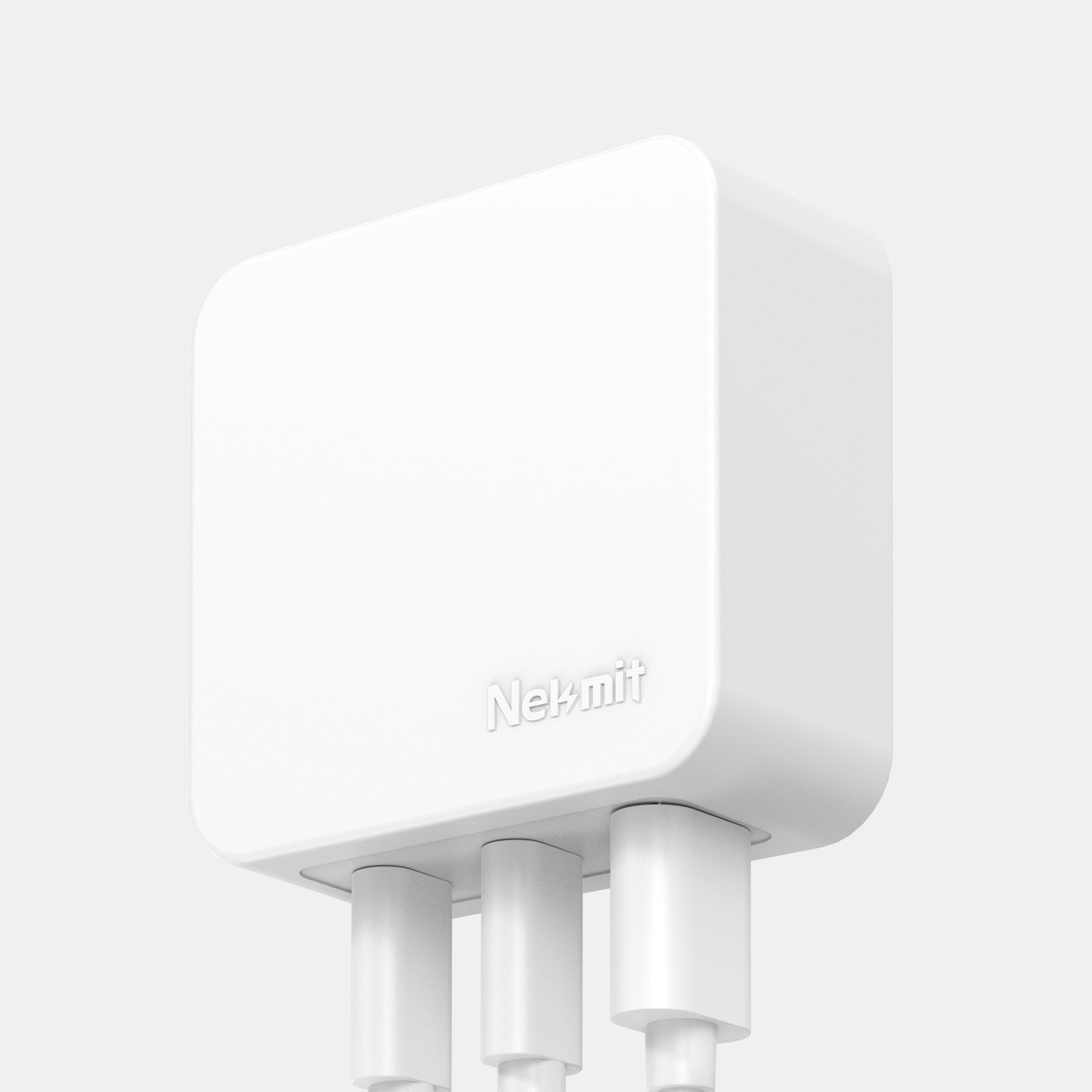 White electronic device with 'Nekmit' branding on a light gray background