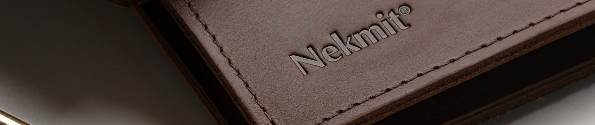 Brown leather wallet with 'Nekmit' branding on a light background