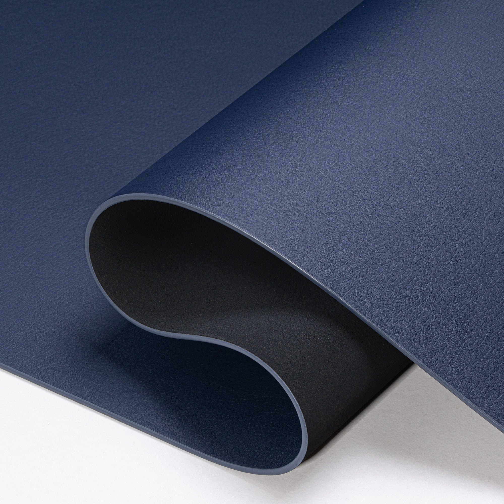 Roll of blue paper on a white background