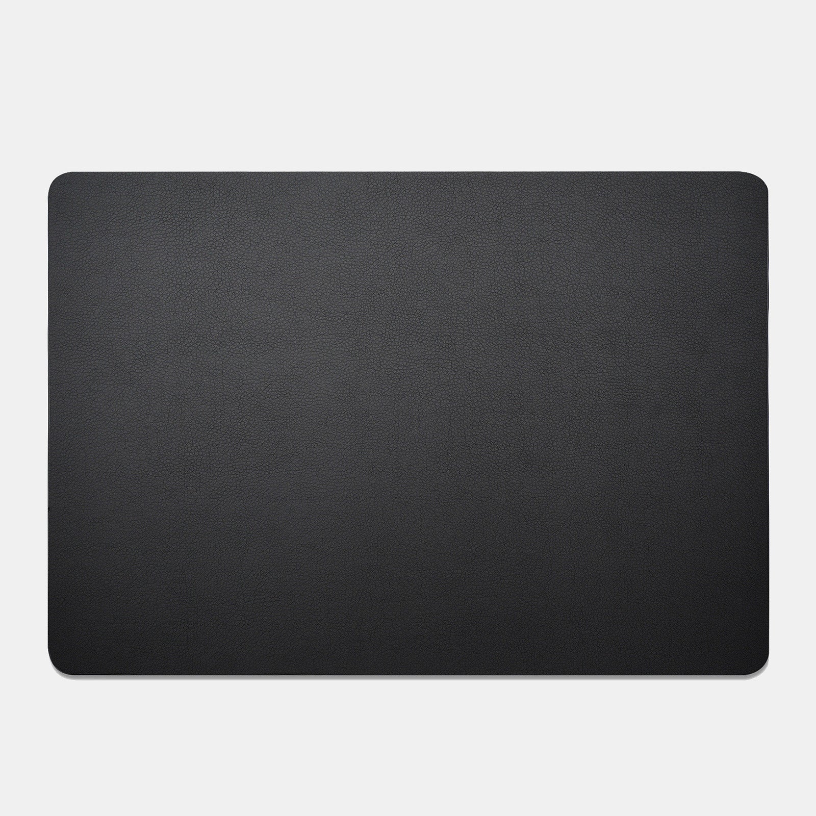 Black rectangular mat on a light gray background